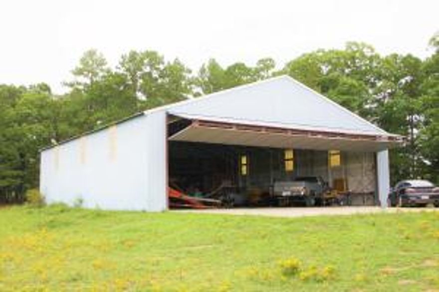 This Native stone Custom built house sitting on a stunning 467 acres is your perfect country dream! With this 5 bedroom and 4 bathroom home there is room for the whole family, complete with a guest house. Offering a 2 car detached garage, barn, green house, in- ground pool, 50x60 insulated hanger, a 24x60 shop, 2,000 ft 6.6 mile runway, 231 acres of pasture, large spring, ponds and 236 acres of timber bringing an abundance of wildlife. This is the place to bring your cattle, horses and hunting gear! Call today to make an appointment!