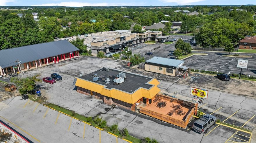 Great Location!  Established Business in high traffic area with high visibility.  TACO LOCO current and restaurant tenant.  Property sold AS_IS real estate only.  Taco Loco restaurant equipment is negotiable outside of asking price.  Rear 5000 sq ft building has one month to month tenant.  3 units available.  Needs remodel.  Great opportunity for investors or restauranteurs.