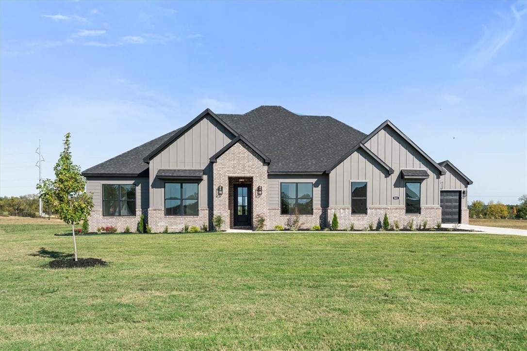 Harmonious Hailey Plan with 4 BR, Study/Dining Room, 3 Bath, with a Mud Room, 3 Car Garage⦠single story home. Luxurious Bedroom One with a fabulous en suite bathroom with a Walk-in Shower and Soaking Tub. Kitchen boasts cabinet to ceiling cabinets, quartz counters, farmhouse sink and Kitchen Aid Stainless Steel Appliances with double ovens! Black fixtures! LED Lighting! Ceiling fans!! Mix of Brick and Hardie board exterior per plan. Asher's Ranch is an idyllic community nestled in the heart of Goshen, Arkansas, known for its picturesque landscapes and serene surroundings. The community boasts meticulously designed and built homes that are situated on expansive lots, with ample space for outdoor activities, gardening, and privacy. The homes are crafted to perfection, featuring modern amenities and elegant finishes that exude luxury and comfort. Come to Asher's Ranch and find your dream home today! Taxes TBD.