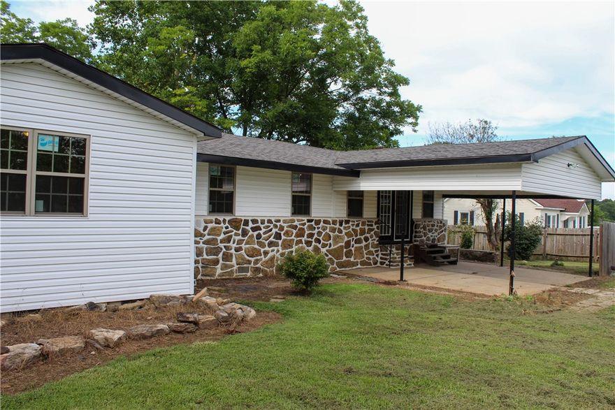 Experience the best of both worlds, peaceful country living just outside city limits while still being conveniently close to town. This beautifully remodeled home sits on a clear, level one-acre lot and is located just a few miles from downtown and less than 5 minute drive from the Dardanelle School District. The home features 3 bedrooms, 1 full bathroom, and a spacious open-concept layout where the living room, kitchen, and dining area blend seamlessly, creating a warm and inviting space. You'll also find a dedicated laundry area and a concrete carport for covered parking. One of the standout features of this property is the large outbuilding, offering endless possibilities for storage, a workshop, or hobby space. If you're looking for space, privacy, and convenience, this property checks all the boxes. Don’t miss your chance to own this well-maintained home with plenty of room to grow and make it your own!