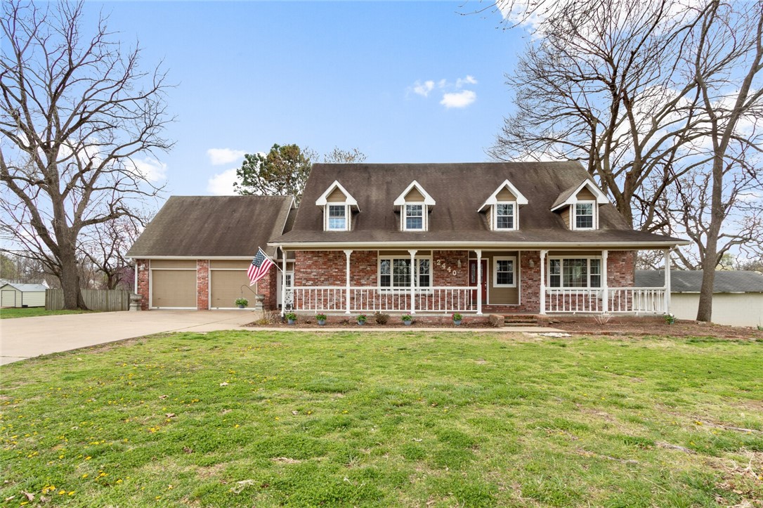 OPEN HOUSE Saturday April 9th from 1-3PM. Incredible location on nearly 1.5 Acres less than two miles from Prominade Mall. Huge Yard with mature shade trees, Massive 2452 SQFT Outbuilding with workshop, Off street parking for Boats, RV's and other toys. Spacious SunRoom overlooking the backyard, Kitchen with commercial refrigerator, gas range and a large walk in pantry. Just in time for summer with the Rogers aquatic center just down the street within biking or walking distance. Spacious front porch gives this home a farmhouse feel. Have a green thumb? This is a perfect canvas to have a large backyard garden Plenty of strawberries are already coming back this year. Seller prefers to sell AS-IS.