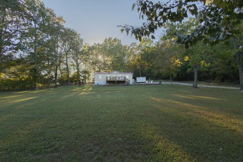 Looking for privacy? This three bedroom, two bath home is located at the very end of the road. Sitting high and mighty with plenty of charm! Situated on 1 acre m/l and featuring a large front deck, metal roof, privacy fenced front yard, storage shed and fenced area. Inside you will find a clean a neat split bedroom floor plan, plenty of natural light in the living room, wood burning fireplace and tasteful upgrades. You donāt find a place like this every day, call to schedule a look.
