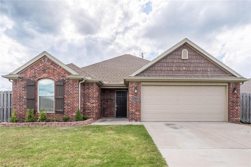 Available now for a 6 month or 12 month lease! This stunning 3 bed, 2 bath home in the Villages of Sloanbrooke blends comfort, charm, and convenience. Just minutes from I-49, the University of Arkansas, trails, top rated schools, restaurants, and parks. Built in 2018, it offers a large living room with a cozy gas log fireplace, granite countertops, and stainless steel appliances, opening seamlessly into the kitchen. Hardwood flooring runs throughout, with tile in the wet areas. Enjoy the fully fenced backyard, covered patio with ceiling fan, and 2 car garage. Refrigerator, washer, and dryer are included. Tenant responsible for all utilities and lawn care. Pets negotiable. Apply today!