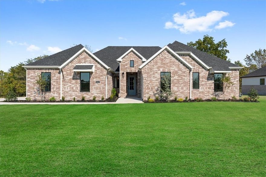 Precious Payton Plan - 4 Bedroom, with a Study/Game room,  3.5 Bathroom and a 3 Car Garage!  Fabulous back Patio.  Huge Walk in Pantry.  Luxurious Bedroom One with a fabulous en suite bathroom with a Walk-in Shower and Soaking Tub.  Kitchen boasts cabinet to ceiling cabinets, quartz counters, farmhouse sink and Kitchen Aid Stainless Steel Appliances with double ovens!  Black fixtures! LED Lighting! Ceiling fans!!  Mix of Brick and Hardie board exterior per plan. Asher's Ranch is an idyllic community nestled in the heart of Goshen, Arkansas, known for its picturesque landscapes and serene surroundings. The community boasts meticulously designed and built homes that are situated on expansive lots, with ample space for outdoor activities, gardening, and privacy. The homes are crafted to perfection, featuring modern amenities and elegant finishes that exude luxury and comfort. Come to Asher's Ranch and find your dream home today! Taxes TBD.