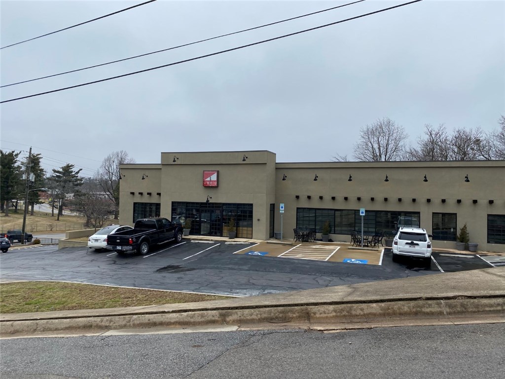 Recently remodeled class A office space located in the heart of Fayetteville close to shopping, parks, and trails. No detail was spared when this modern office space was remodeled. Everything you need from hi-tech to meeting rooms, open work areas, and private offices. This space can also be sub-divided for the right tenant or if the investor/end user does not need the entire space and wants to generate additional income. Don't miss this opportunity for sale or lease.