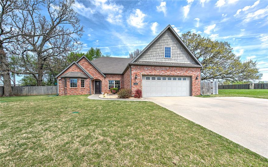 Stunning, spacious home in the heart of Lowell offering comfort, convenience, and flexibility. Beautifully updated and thoughtfully designed, this immaculate 4-bedroom home features a spacious kitchen, two primary suites, bamboo hardwood flooring, instant hot water, and the rare bonus of two refrigerators. With 4 full baths and a versatile above-garage bonus suite complete with its own bath and closet, the layout is ideal for guests, a home office, or multi-generational living. Enjoy a large, tree-lined backyard with a new patio—perfect for relaxing or entertaining. Inside, you’ll find freshly painted rooms, stylish new lighting, and a walk-in attic with abundant storage. Designed with accessibility in mind, the home includes wide doorways, a walk-in shower, easy entry, and an oversized driveway for additional parking. Located in a quiet, sidewalk-lined neighborhood with a charming rural feel, yet just minutes from some of the best shopping, dining, medical facilities, and easy access to Bentonville and Rogers!