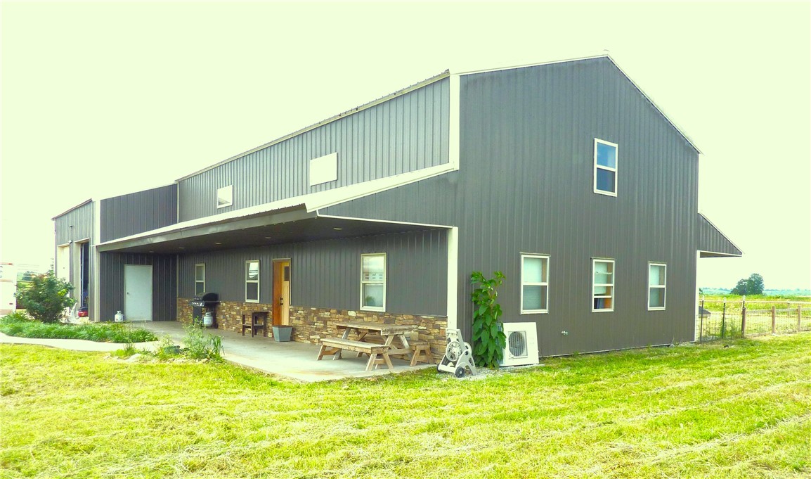 Country Barndo-minium style with open floor plan. Three bedrooms with upstairs unfinished room that could be a 4th bedroom, office or sitting room. Total 360 view/s. Upstairs is open for your imagination. A piece of tranquility with 360 views. Property is fenced and cross fenced with three (3) ponds. 60X100 barn with hay loft has lean-to attached. Nice level area with pipe fence corral and working pens for arena. 67 acres +/- Excellent pasture. Great opportunity for family ranch or mini farm.