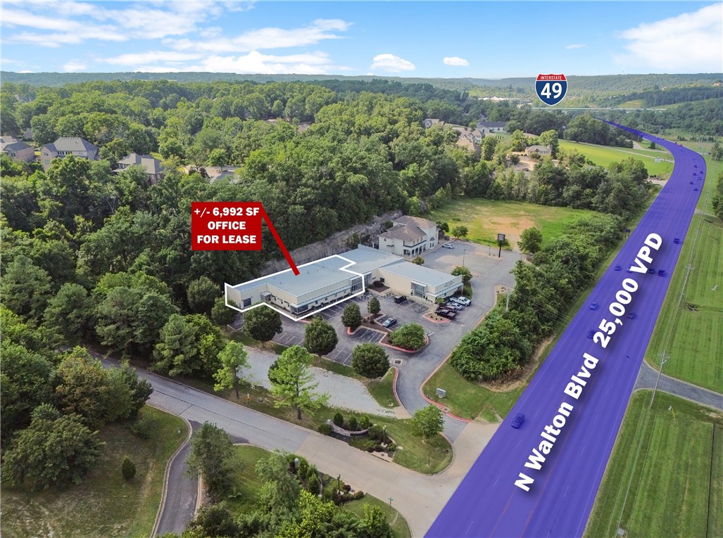 +/- 7,000 SF of versatile office/medical space for lease in Bentonville. This well appointed space includes a welcoming reception and waiting area, 17 private offices or patient rooms, three restrooms, a kitchen and break room, a storage closet, and two large work rooms that can serve as conference rooms, break areas, or additional waiting spaces. Conveniently located just off N Walton Blvd, which sees around 25,000 VPD, the property is less than 1 mile from the I-49 interchange and directly across from the Bark Park and North Bentonville Trail. Offered on a NNN lease with a minimum 3 year term, tenants are responsible for their pro-rata share of utilities, taxes, insurance, lawn care, trash, etc. Available for occupancy starting October 1st. Ideal for medical, dental, or professional office use.