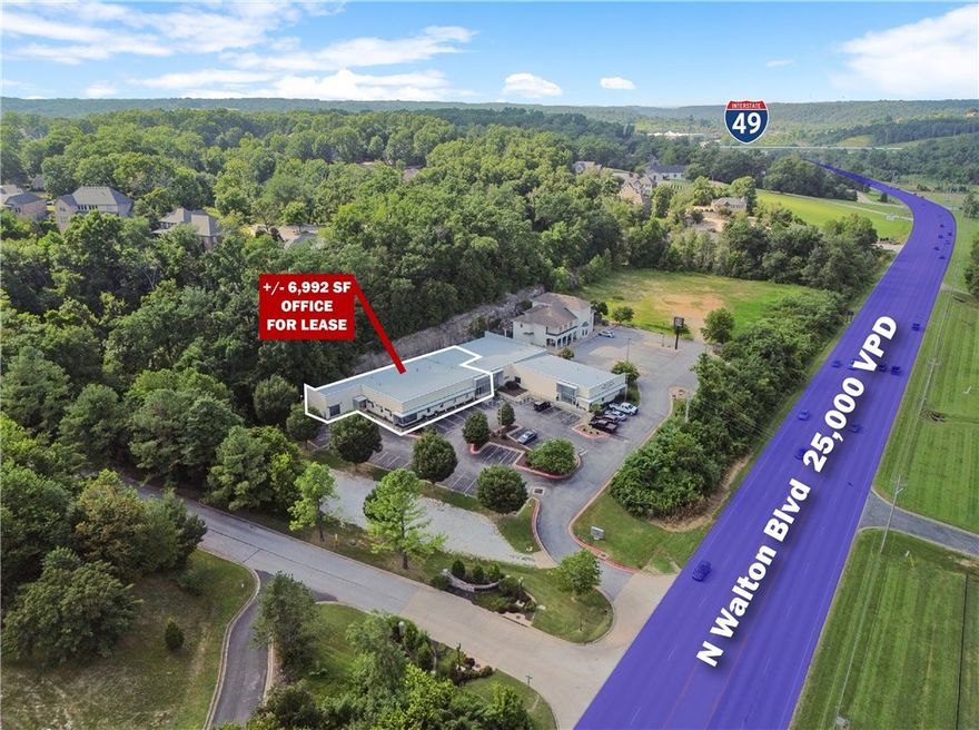 +/- 7,000 SF of versatile office/medical space for lease in Bentonville. This well appointed space includes a welcoming reception and waiting area, 17 private offices or patient rooms, three restrooms, a kitchen and break room, a storage closet, and two large work rooms that can serve as conference rooms, break areas, or additional waiting spaces. Conveniently located just off N Walton Blvd, which sees around 25,000 VPD, the property is less than 1 mile from the I-49 interchange and directly across from the Bark Park and North Bentonville Trail. Offered on a NNN lease with a minimum 3 year term, tenants are responsible for their pro-rata share of utilities, taxes, insurance, lawn care, trash, etc. Available for occupancy starting October 1st. Ideal for medical, dental, or professional office use.
