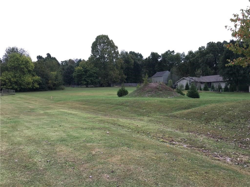 Amazing location - 5 minute walk to Lake Fayetteville Park, bike trails and about a mile to the Springdale Country Club. Great opportunity for an Estate Home in the middle of everything. Very private and at end of the street. This land is subdivided into two .35 lots if buyer is looking to build multiple units.