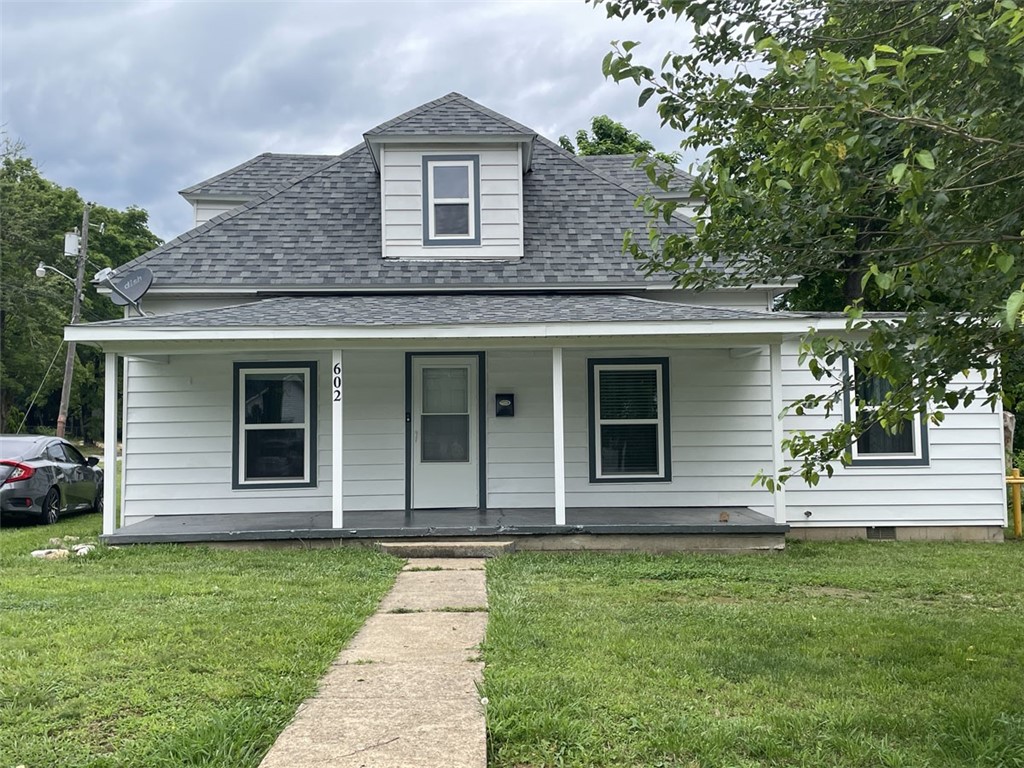 This cute little bungalow with classic loft bedroom has charm and curb appeal! It's been well-cared for and is ready for a new owner. Convenient location on a corner lot near downtown Berryville, near all of the amenities Berryville has to offer. Eureka Springs is only 30 minutes away, Branson is only an hour. This property has the potential to be a home, short-term rental, or long-term rental. New floors and deck. Washer and dryer do not convey.