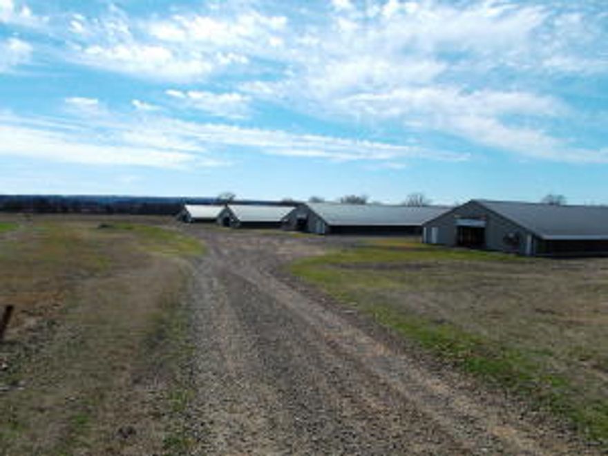 40 Acres M/L 4 OK Foods Poultry Houses 43x510 ft. All New upgrades including Generator & Computer controlled. 25,000 bird capacity per house.Great Cash Flow, also has natural Gas, 5 wells and city water. Triple Wide manufactured home with concrete foundation. This place also has 240x400 barns that can be used for hay or litter.