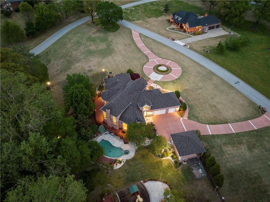 Welcome to your dream home at 11149 Cobblestone, nestled in the charming city of Bentonville, AR. This exquisite property boasts a perfect blend of contemporary elegance and comfortable living, offering a truly exceptional lifestyle for you and your family. Located in a highly sought-after neighborhood of Bentonville, every detail has been carefully curated to create an inviting atmosphere, offering both comfort and sophistication. The heart of this home is undoubtedly the gourmet kitchen. The luxurious master suite is a private sanctuary for relaxation. The property offers an outdoor oasis with a stunning pool, cozy outdoor seating areas, and a sprawling backyard. Whether you're a growing family or someone looking for a peaceful retreat, this property offers the best of Arkansas living.