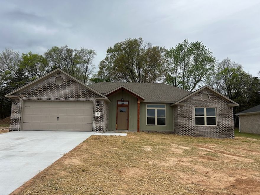 WELCOME HOME to this beautiful 3-bedroom, 2-bath brick home in a lively new subdivision just minutes from Mount Nebo State Park. Designed with a desirable split floor plan, this home offers both comfort and privacy. The open-concept living and kitchen area is perfect for everyday living and entertaining, featuring a spacious dining area, large island, and a generous pantry. Thoughtful layout and quality finishes throughout make this home as functional as it is inviting. Enjoy the charm of a growing neighborhood with easy access to outdoor recreation, scenic views, and modern conveniences.