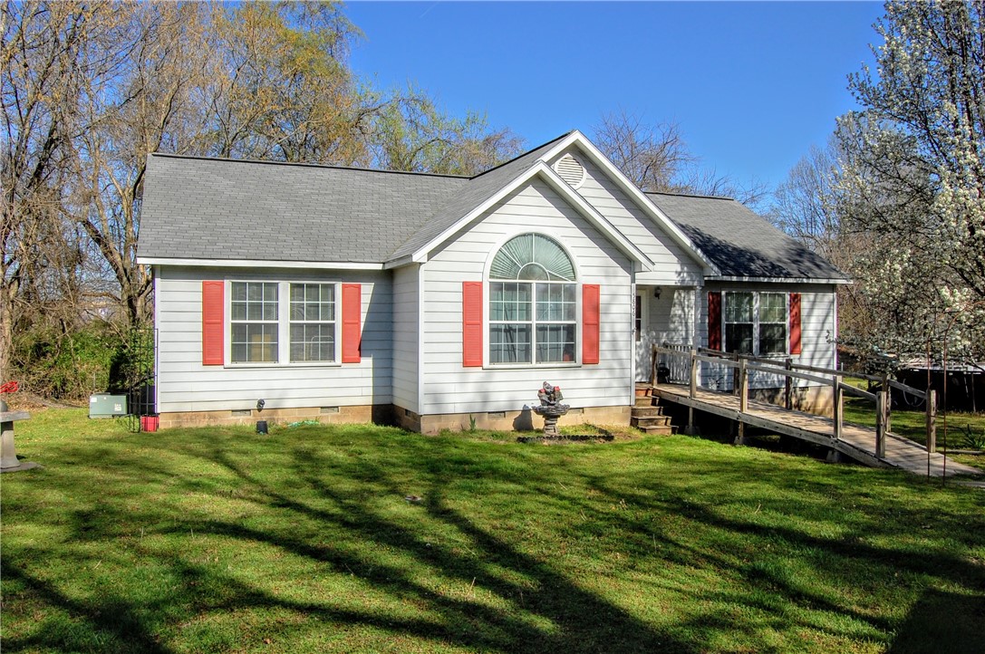 This home is snuggled in the center of Johnson just off of Main Street. A United Built home built in 2005, this will make a great starter home or investment property. Sale is subject to the approval of the US Bankruptcy Court of Western Arkansas.