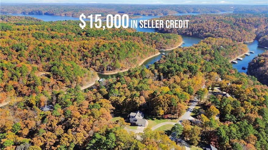 $15,000 SELLER CREDIT Discover exceptional value at this 4-bed, 2 full & 2 half baths estate on 5.15 serene, partially wooded acres in Point at Falls Hollow, minutes from Beaver Lake & downtown Rogers. Spacious 3,643 sq ft home with 2,125 sq ft 3-car garage (14' door, 16' ceiling—perfect for boat/RV or car lift). Three levels feature high ceilings, abundant light, and open flow between living, dining, and family areas. The kitchen boasts granite counters, stainless steel appliances, ample cabinetry, and a center island. Main-level primary suite offers dual closets (one cedar-lined) and a remodeled walk-in shower. Upper level: 2 beds + full bath. Finished walk-out lower level includes 4th bed, full bath, rec space with new carpet, bonus room, and storage. Includes 20kW whole-house generator, large deck, patio, circular drive, and mature landscaping. Ideal for privacy and entertaining.