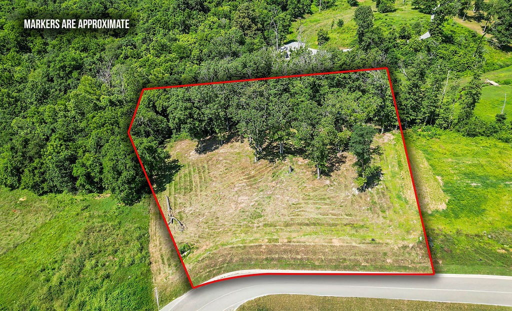 Rare Opportunity to Build in a Premier Natural Setting! Nestled in one of the area's most sought-after neighborhoods, this 1+ acre buildable lot offers the perfect blend of luxury living and natural serenity. Backing directly to the protected Healing Springs Natural Area, youāll enjoy access to a tranquil spring-fed pond and waterfallāa truly exceptional backyard view and retreat. The lot is gently sloped, mostly cleared with some mature trees, and ready for your dream home. 5 minute drive to XNA, 24 minutes to Walmart Home Office, 18 minutes to Pinnacle Hills Promenade. Water, electric, and gas are available at the street, and a septic plan is on file. A thoughtfully designed house plan is also available, giving you a head start on the building process. With direct access to peaceful walking trails and the calming sounds of running water just beyond your property line, this is a rare chance to build a home that feels like a retreatāevery day.