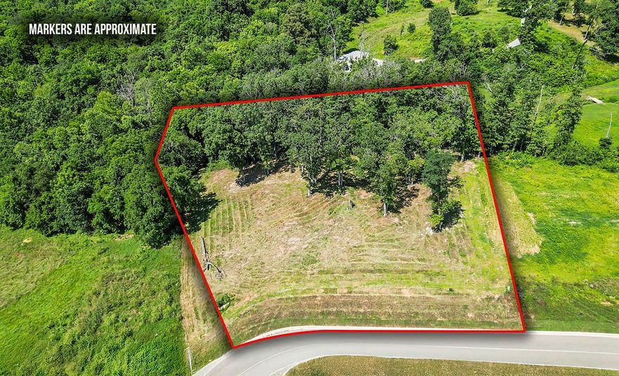 Rare Opportunity to Build in a Premier Natural Setting! Nestled in one of the area's most sought-after neighborhoods, this 1+ acre buildable lot offers the perfect blend of luxury living and natural serenity. Backing directly to the protected Healing Springs Natural Area, you’ll enjoy access to a tranquil spring-fed pond and waterfall—a truly exceptional backyard view and retreat. The lot is gently sloped, mostly cleared with some mature trees, and ready for your dream home. 5 minute drive to XNA, 24 minutes to Walmart Home Office, 18 minutes to Pinnacle Hills Promenade. Water, electric, and gas are available at the street, and a septic plan is on file. A thoughtfully designed house plan is also available, giving you a head start on the building process. With direct access to peaceful walking trails and the calming sounds of running water just beyond your property line, this is a rare chance to build a home that feels like a retreat—every day.