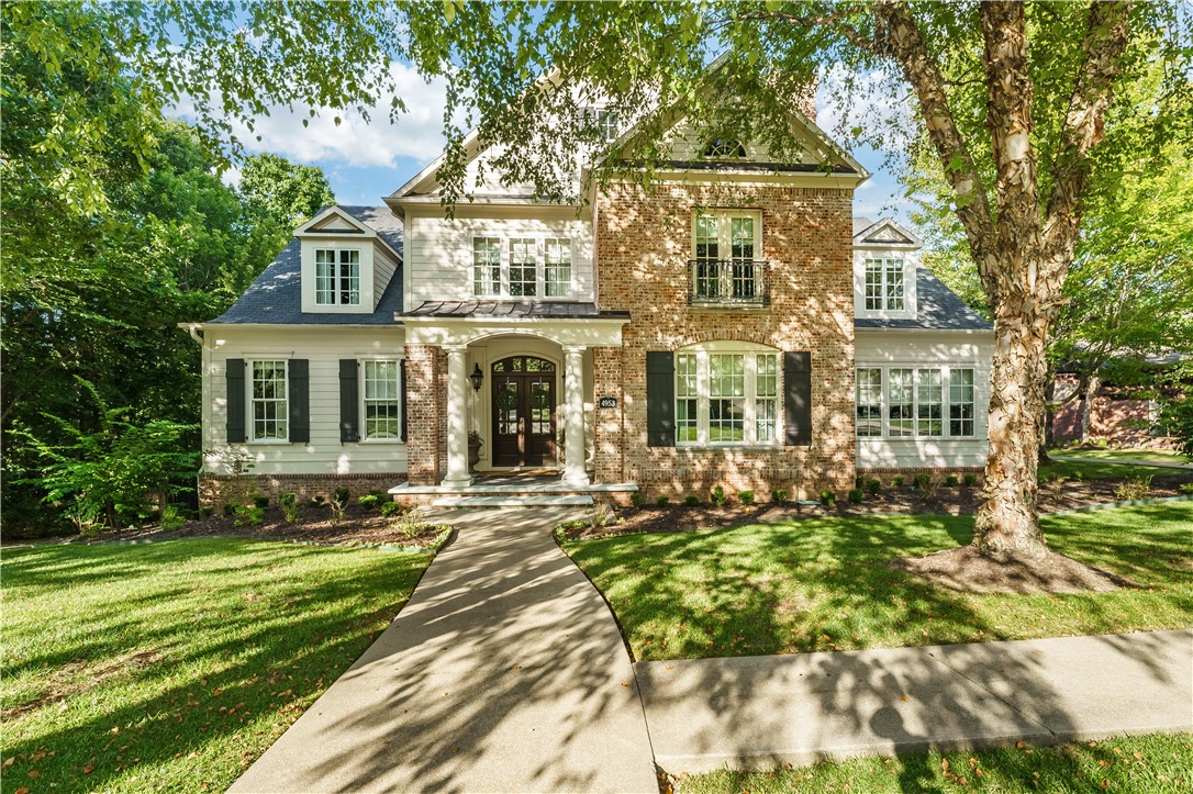 This stunning custom-built 4-bedroom, 3.5-bath home nestled in the highly sought-after Clear Creek subdivision, located within the gated community of The Blessings Golf Club. Thoughtful upgrades throughout the interior include fresh paint, updated flooring, a beautifully renovated kitchen, and all three HVAC units replaced—offering peace of mind and modern comfort. This home truly has it all: a gourmet kitchen, hardwood floors, formal living and dining rooms, a spacious family room, bonus room, media room, and two fireplaces. Enjoy outdoor living on the expansive 11x31 screened-in porch—perfect for relaxing or entertaining. Built with quality craftsmanship by C&S Custom Homes and situated on a corner lot with mature landscaping and elegant wrought iron fencing. This one is a must-see—your perfect home awaits!