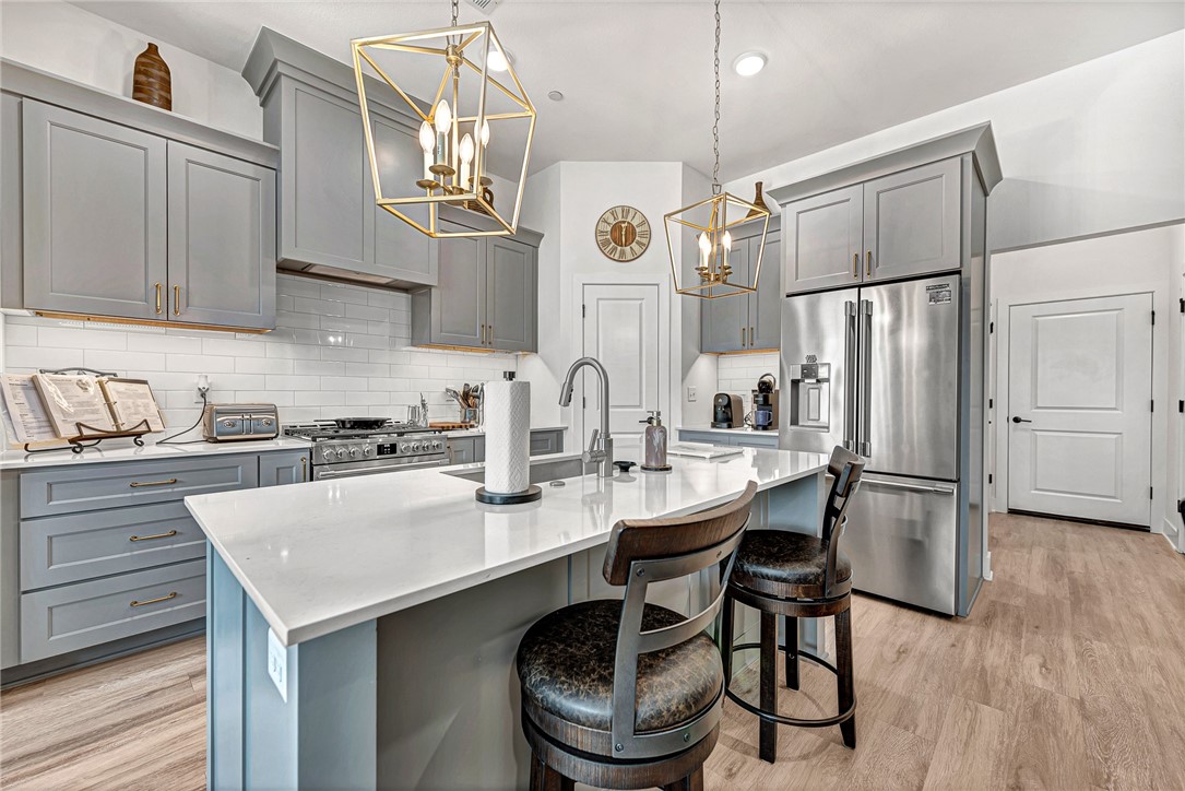 Right where you want to beāwelcome to Pinnacle Hills living! This stylish townhome puts you steps from all the action: the Promenade, Top Golf, Walmart AMP, Blossoms on the Green Golf Course, and some of the best restaurants and shops in Rogers. Craving nature? Youāre surrounded by trails, greenway, mountain biking, unpaved, and walking paths - all just outside your door. Inside, the details shine: granite countertops, Energy Star appliances, LED lighting, gas cooktop and oven, pantry, programmable thermostat, and an eat-in kitchen perfect for casual mornings or cozy dinners. Add in ceiling fans, attic storage, washer, dryer, refrigerator, and itās everything you need for low-maintenance, high-comfort living. Whether you're commuting, relaxing, or exploring - this home is your gateway to it all.