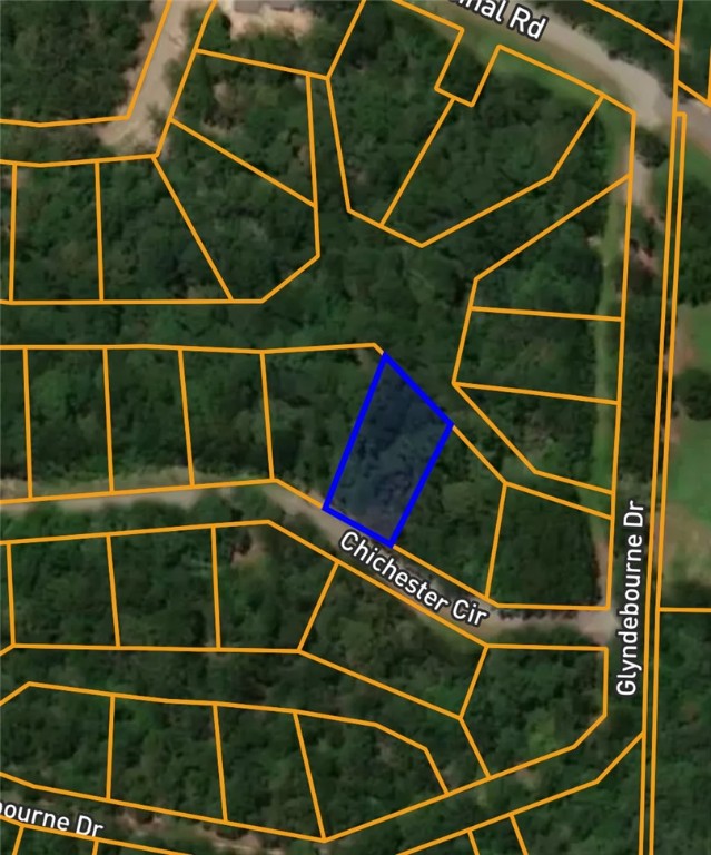Located in the peaceful Sussex Subdivision of Bella Vista, this 0.28-acre lot offers a great opportunity for investment or future development. Situated in Benton County and within the Bentonville School District, the property features a desirable location near nature trails, golf courses, and community amenities. With no timber acreage and easy access via Chichester Circle, this residential lot is part of a well-established neighborhood with a scenic setting and convenient access to city services.