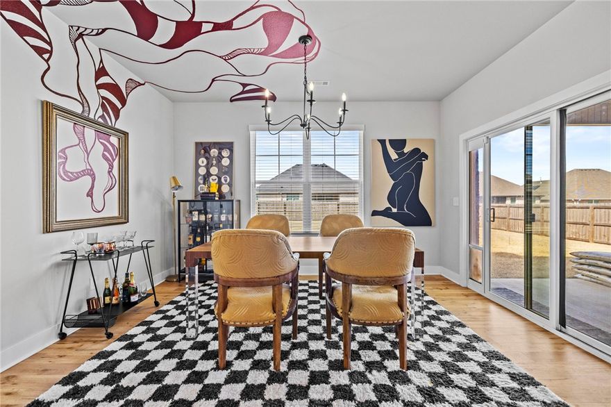 Originally the model home for the subdivision, this 4-bedroom, 2.5-bath beauty was built to impress from day one. Loaded with premium finishes and upgrades.
Rich hardwood floors, soaring 20-foot vaulted ceilings in the living room, and 9-foot ceilings throughout the main floor. The kitchen delivers granite countertops, stainless steel appliances, a large walk-in pantry, eat-in dining with a bar, and a separate formal dining area.
The primary suite is on the main floor, a true retreat with a standalone soaking tub and oversized walk-in shower. Three additional bedrooms are upstairs, ideal for kids, guests, or a home office.
Out back, a covered patio and wood privacy fence give you a private backyard ready for whatever you want to make of it  morning coffee, movie nights, or room for the dogs to run. 
The neighborhood delivers too: community pool, top schools, city park, bike trails, grocery and medical all close by. 
This was the home they built to sell the subdivision.  ** $4,500 PREFERRED LENDER CREDIT**