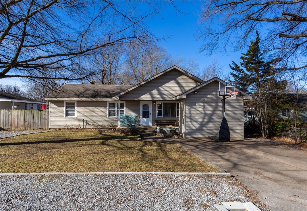 HUGE PRICE REDUCTION on this great 2217 sqft 4 bedroom 2 bath home with mother in laws quarters, man cave or income producing rental (not included in the sqftage, bedrooms or bathrooms) in the nice fenced in backyard with nice mature trees! This home has lots of updates including brand new in HVAC in January 2019 with 10 year warranty! This home has a large open living space, and has a great location on a quite street with quick access to hwy 412, mt olive and Siloam Springs thriving downtown and our great schools and parks! If you are looking for a nice home with a great location in town and at a great price per square foot.. Look no further!