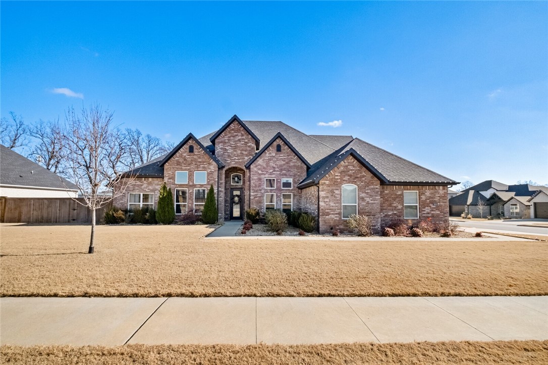 Stunning Corner Lot Home in Sought-After Subdivision! This incredible 5-bedroom, 3.5-bathroom home offers over 3,300 sq ft of luxurious living space and is situated on a corner lot in a desirable subdivision. The main floor features gorgeous real hardwood floors throughout the entry, formal dining room, office, living room, kitchen, and primary bedroom. The kitchen is a true highlight with a spacious island, custom cabinetry with soft-close doors and drawers, a convenient pot filler, and a butler's pantry. The primary suite is an absolute retreat, complete with a stand-alone tub, beautifully tiled shower, and an expansive wrap-around closet you have to see to believe. Additional features include central vacuum, irrigation system, wired for sound, solar panels and a large patio with a cozy fireplace for ultimate outdoor relaxation. This home truly checks all the boxes and offers everything you need for comfortable and stylish living. Don’t miss the chance to make it yours!