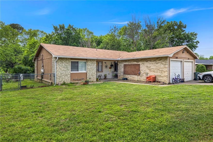Excellent investment opportunity in the Sought-After Rolling Hills area! Perfectly positioned across from Butterfield Elementary School and just minutes from the Razorback Greenway Trail, shopping, dining, and more, this property offers convenience, charm, and long-term value. Each unit features 2 bedrooms, 1 bathroom, and enjoys private, fenced backyard areas—perfect for tenants with pets or a love for outdoor living. Both units also share access to a 2-car garage, offering ample storage or parking flexibility. Recent 2024 updates include remodels of both kitchens and bathrooms, and each side is equipped with a newer refrigerator, washer/dryer, and all appliances convey. A beautiful creek runs along the back of the property, adding a serene, natural backdrop that adds privacy and sets this property apart. Whether you're looking to expand your investment portfolio or live in one unit while renting the other, this property checks all the boxes and has great rental history.