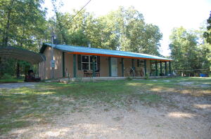 Nestled on 14 acres M\L near Bull Shoals Lake this home gives you plenty of privacy to enjoy the Arkansas Ozarks ! Abundant wildlife roams the property for the hunters and nature lovers. Also, the property boasts a cave to explore. Home has nice open floorplan with excellent covered patio for cookouts or to enjoy the scenery, multiple outbuildings and a chicken coup give you excellent storage and a place to keep your laying hens for farm fresh eggs.