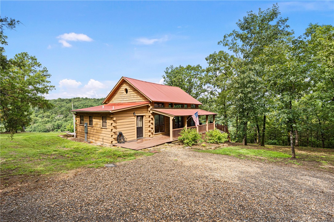NEW LISTING | Piney Bay Cabin Retreat
This incredible cabin overlooking Piney Bay is currently a profitable Airbnb, but could just as easily be your personal escape into peace and privacy. Whether youāre looking to invest or unwind, this property offers the best of both worlds. Set on a secluded lot with panoramic views, the cabin features:
Comes Fully furnished. Roll-up garage doors that open to a large, covered deck with sweeping water views. Private hot tub and ping-pong table for year-round enjoyment. Wood-burning fireplace perfect for cozy evenings. Spacious open floor plan with natural light pouring in from every direction
Windows thoughtfully placed to frame the view from every angle. A charming spiral staircase leading to a cozy loft sleeping area. Surrounded by trees, offering total seclusion and serenity. This is more than just a cabināitās an experience. Whether youāre seeking strong short-term rental income or a quiet getaway to recharge, this one checks every box.