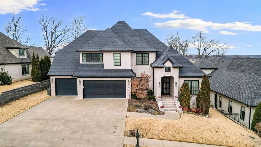 Set within the highly sought-after Shadow Valley community, this exceptional residence combines refined design with elevated comfort just moments from the clubhouse. Endless windows bathe the home in natural light, highlighting hardwood floors throughout both levels & custom built-ins that add character & function. The thoughtfully designed layout features both the primary suite & a secondary bedroom on the main level, while upstairs offers additional bedrooms—each with its own ensuite bath—plus a spacious bonus room. The 2025 renovated primary bath creates a true retreat with a jetted tub & steam shower featuring a Kohler Duet rainhead. At the heart of the home, the chef’s kitchen showcases KitchenAid appliances, double ovens, a 12-foot island, wine fridge, & walk-in pantry. Enjoy modern conveniences including surround sound throughout the home & back patio, EV charger, central vacuum & abundant storage. The covered back deck overlooks a beautiful valley backdrop & a spacious yard with plenty of room for a pool!