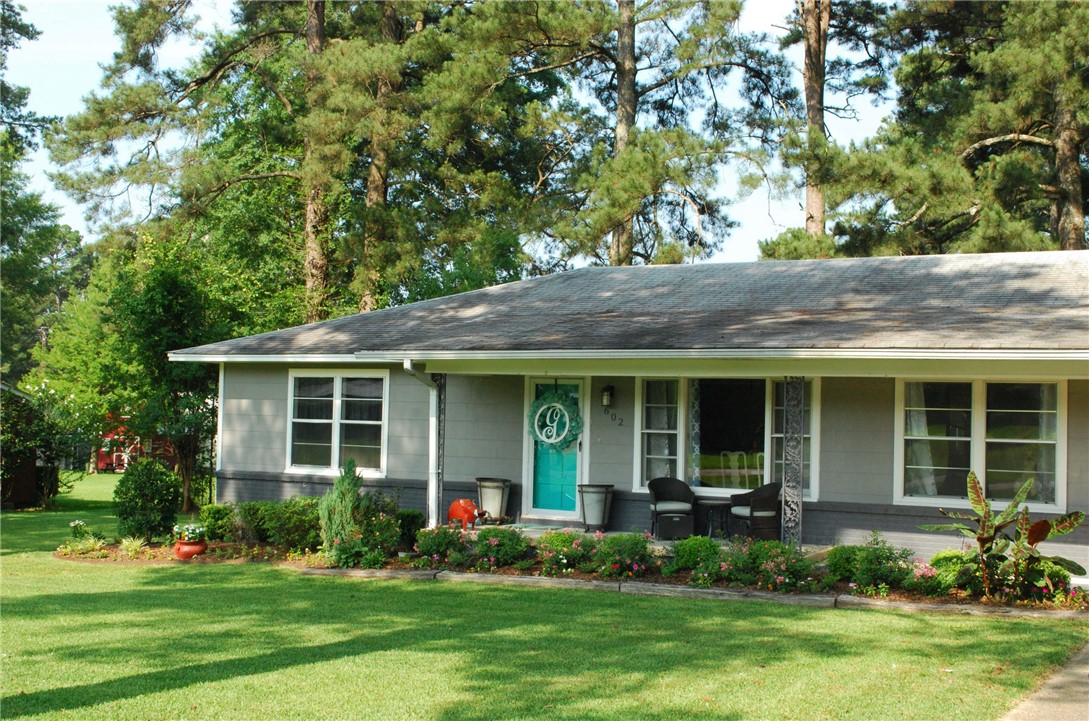 3 bedroom 2 bath, 1900 square foot home in desirable neighborhood in El Dorado. Completely updated throughout. Split floor plan with large master suite with walk-in closet and en-suite. Master has feature wall with access to the laundry room. Custom shower, soaking tub and dual vanities are featured in this relaxing retreat. Kitchen opens to breakfast area with island and granite countertops. New lighting and ceiling fans throughout to enhance the recessed lighting in the living areas. Deck can be accessed from the master bedroom or kitchen area to enjoy the 0.65 acre lot complete with chain linked fence and large storage building.