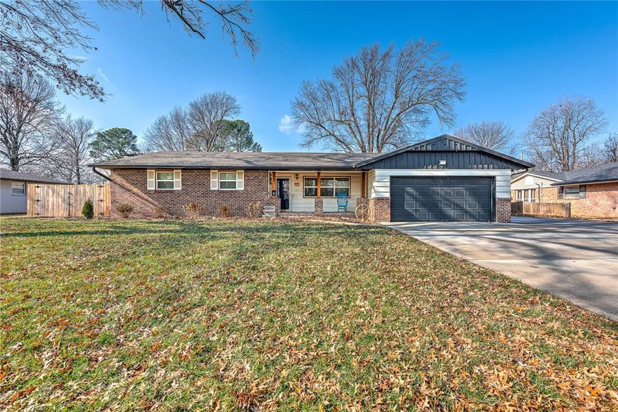 Beautifully updated home in the heart of Central Springdale! This inviting property features spacious living and dining areas filled with natural light, ideal for everyday comfort and gatherings. The upgraded kitchen shines with granite countertops, a designer backsplash, and modern finishes. Recent updates include a new roof, larger A/C unit, central heater, and water heater.

Outside, enjoy an oversized backyard with a detached workshop and covered work area—perfect for storage, hobbies, or projects. The extra-wide concrete driveway offers easy access to the backyard shop. Ideally located near popular dining options, shopping centers, daily conveniences, and nearby schools, with Walmart Supercenter just about a mile away. A move-in-ready home in a fantastic location!