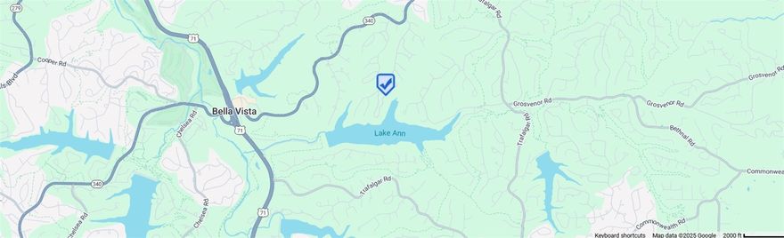 Great lake area location, with a seasonal lake view, conveniently close to Lake Ann, offering three walking distance access points. A short drive to 71-B (Bella Vista Way), Berksdale Golf Course, Bella Vista Country Club, and The Bella Vista Town Center are five minutes away. The Summit School, and Flo Ride Bike Trails are nearby. This lot has two access point choices off Bosworth Circle, top and bottom. This is a gently sloped buildable lot. Also, Perc tested for a three or two-bedroom home is available upon request. Lot corners are flagged pink/orange for ease in showings. Friendly owner financing is available. Appointment only.