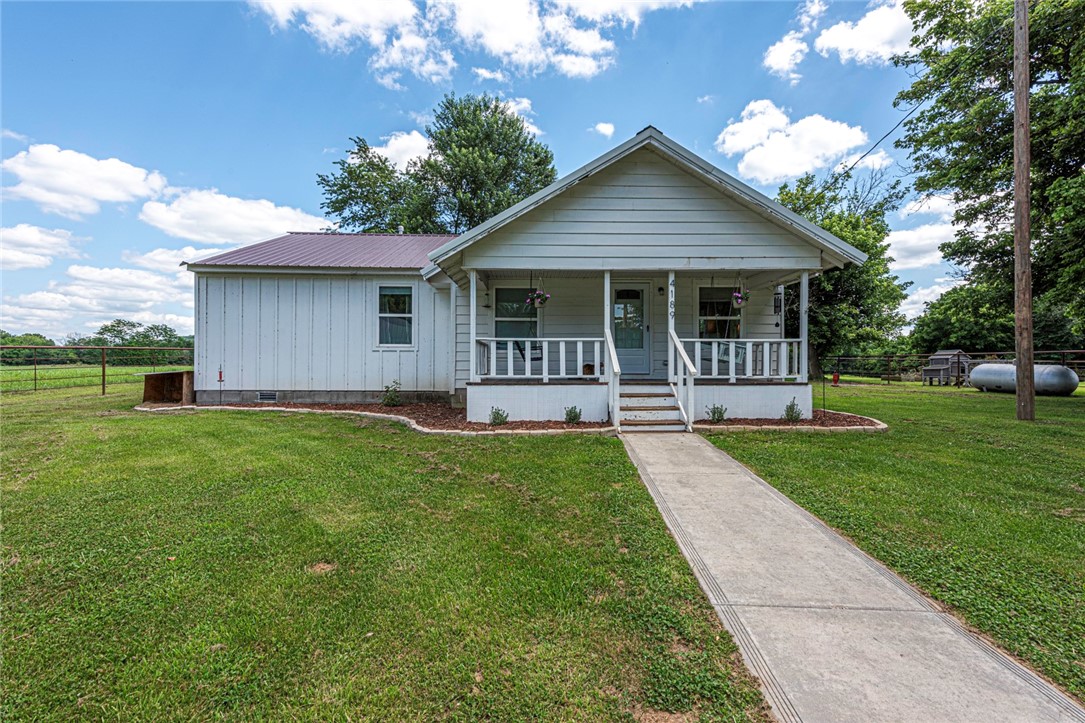 WELCOME! This 3 bedrm 2 bathrm home on 7.2 acres +/- is just what you have been waiting for! This rural property is 10 min away from downtown Huntsville & an hour away from Ozark National Forest with outdoor attractions such as Hawksbill Craig & Lost Valley! Renovated in 2020 by the previous owners, boasts open concept living feat: wood look tile flooring, vaulted ceilings with wood details, & wood stove with rock wall. U-shaped kitchen feat: concrete counters, stainless steel apps & gas range, apron sink, & ample storage w/ live edge wood counter! RelaxĀ in the primary bedrm withĀ private ensuite feat: dual sink vanity, & framed shower! Enjoy 2 more bedrms + 1Ā more bathrm! Out back enjoy the deck! + 202sqft room in garage w/ mini-split. Fenced area w/ 250sqft pole shed perfect for a hobby farm! AND 297 sqft storage building/storm shelter! BONUS- This property feat wooded areas for exploring, and bank/river access to War Eagle Creek! Washer/Dryer/Fridge convey! Donāt Miss Out on this outdoor retreat! Inquire today!