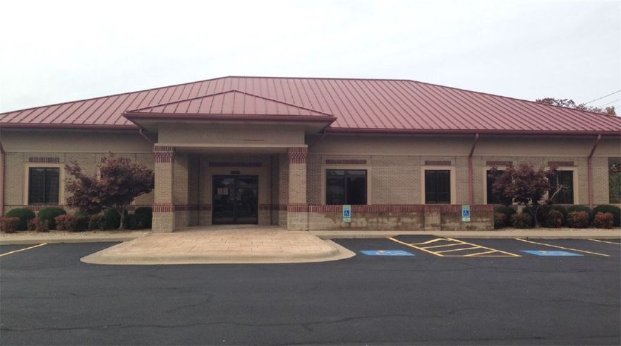 Neighborhood retail area with banks, strip centers, and churches.