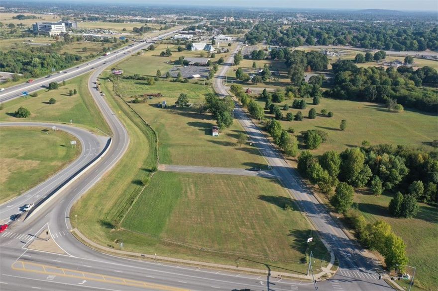 One of the last corner lots available at the corner of Don Tyson Parkway and I-49.  The property is located with close proximity to Walmart Neighborhood Market, Arkansas Children's Northwest, Arkansas Natural's Baseball, Sam's Club and several restaurants.