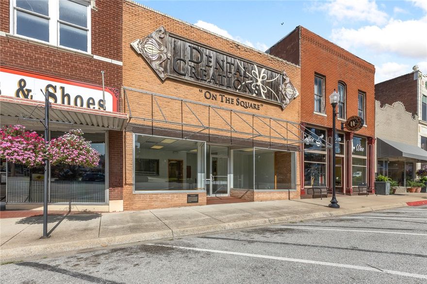 Don’t miss the opportunity to own 6,480 finished sq/ft of flexible commercial space on the historic square in Harrison. Currently configured as a dental office, this property offers a versatile layout as all interior walls are non-load bearing, allowing you to customize the space to suit your needs. The main level includes: a waiting room, reception space, 4 offices, 6 operatories with CAT 5, water, vacuum & air at each station, 4 exam rooms, lab tech, touch-less sinks, 5 bathrooms (4 half, 1 full), including 2 ADA-compliant restrooms and more. Upstairs features a large open space, kitchen with dishwasher, washer/dryer hookups, a half bath and additional storage, making it ideal for expanding operations or even converting to loft-style living or co-working space.  Added benefits: HEPA air filtration system w/ 6 filters in the operatory rooms. Whether you're an investor, medical professional, or entrepreneur, this property delivers unmatched potential in a prime location with consistent foot and vehicle traffic.
