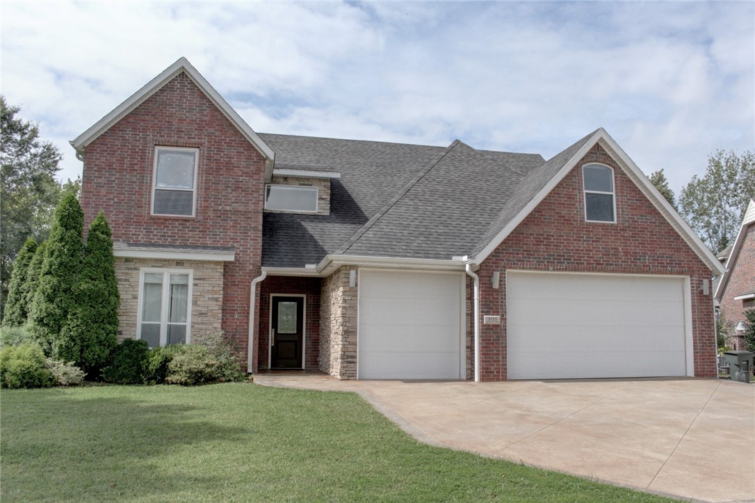 Conveniently located across from the Fayetteville Botanical Gardens, Lake Fayetteville, and Razorback Greenway trails, this 3,722 sq ft all-brick home blends modern design with efficiency. On a half-acre lot, it offers 4 bedrooms, 3.5 baths, and 5-Star Energy features including smart HVAC, wired for whole-house sound, LED lighting, instant hot water, and EV-ready garage. The main level showcases polished concrete floors, a chef’s kitchen with induction range, large island, smart oven, and walk-in pantry, plus a stylish floating staircase with under-bar and a stunning primary suite with whirlpool tub, dual vanities, and walk-in shower. Upstairs includes 3 bedrooms, 2 baths, an extremely spacious media/game room, and a playroom with lofts. Outdoor living features a covered patio, fire-pit, hot and cold water in rear of house, 3-car garage, and gas line for grilling, backing to a creek with room for a pool. Quiet neighborhood with sidewalks, near shopping, eating and more.