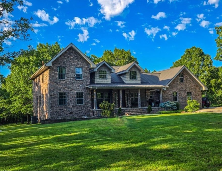 If you are looking for your dream home in an even more stunning setting, this home is the one for you! Sitting on nearly 18 acres, and within 20 minutes of Harrison, this custom built home has it all! As you enter the front door, you are greeted with an incredible view. The beautiful fireplace, open floor plan and cathedral ceilings makes this home extremely cozy. Windows covers curtain. There are 4 bedrooms, 2 1/2 baths, with granite counter tops and hardwood floors. All bedrooms are carpeted for comfort. There is stone fire pit and a concrete water fountain. There is a 2 car attached garage and two out buildings as well. Plenty of storage for vehicles or farm equipment. Wildlife galore in a beautiful park like setting. This residence has had numerous upgrades with an amazing concrete driveway you must see. Don't miss out on this one!