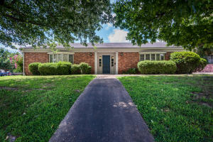 1,806 sq ft all brick professional building near downtown. Recent updates include new interior paint, tile, and carpet. Has receptionist area, 2 large offices, conference room, work area, 2 baths, and break room. Property has endless possibilities, comes with a vacant adjacent lot with room to grow.