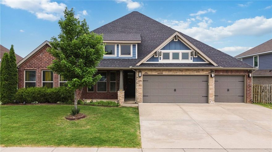 Enjoy the perfect blend of luxury, comfort, and convenience in this stunning EAST facing home located just steps from Bentonville West High School. Spend your afternoons at the neighborhood pool and clubhouse or relax by the stocked community pond. Inside, you’ll fall in love with the impressive floor-to-ceiling stone fireplace, gorgeous wood beams accenting the cathedral ceilings, elegant wainscoting, and designer touches throughout. The thoughtfully designed kitchen features a spacious walk-in pantry and stylish butler’s pantry, perfect for entertaining and everyday living. This home is also plumbed for both a central vacuum and irrigation system for added convenience. Step outside to enjoy the extended back patio, two covered porches, and two cozy fireplaces that create inviting spaces to gather year-round. Homes with this level of style and amenities rarely last long!