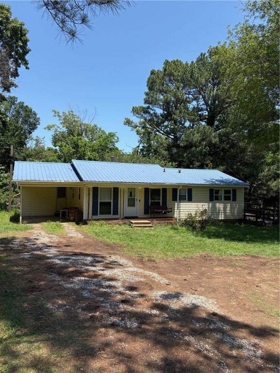 Nice home just outside of town. Home has 3 bedroom, 1.5 baths, carport, vinyl siding, metal roof, new kitchen floor and fresh paint. Also it has new kitchen cabinets, dishwasher , range and micro-hood. HWA warranty is negotiable.