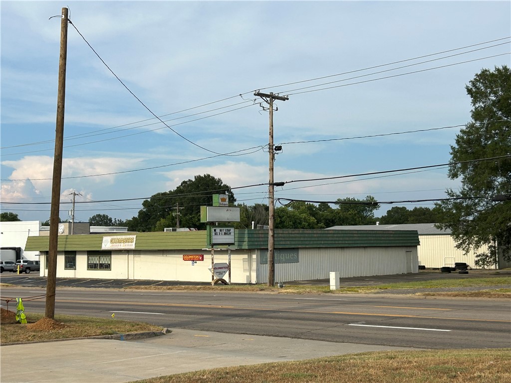 Prime Commercial property available on S Arkansas Ave. A 8,000 Square foot building plus a vacant lot and house that is currently rented. Three properties for the price of $750,000, buildings only. Goldmasters is not going out of business! They plan to move.