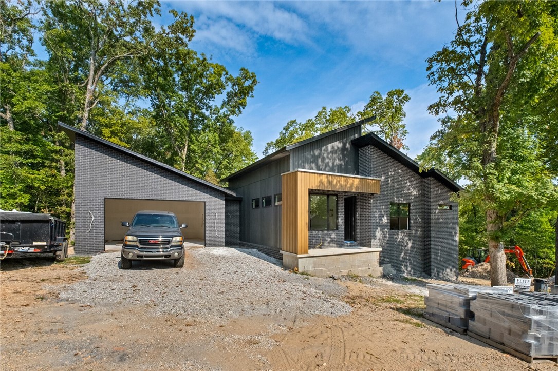 Low-Maintenance Modern Living! Welcome to this stunning new construction home featuring a cozy yet modern design with high-end finishes throughout. Thoughtfully crafted for
todayās lifestyle, this residence offers an open-concept layout filled with natural light, sleek lines, and timeless style.
The low-maintenance exterior and landscaping allow you to spend more time enjoying your home and less time on upkeep. Inside, youāll find designer details, premium flooring,
energy-efficient features, and a carefully curated color palette that blends comfort with sophistication.
Perfect for those who desire both luxury and convenience, this home offers a warm, inviting atmosphere while maintaining the elegance of modern architecture.
Outdoor enthusiasts will love the dedicated bike wash station and easy access to a scenic nearby bike trail, making this the perfect spot for an active lifestyle.
Move-in ready and designed to impressādonāt miss the chance to call this modern retreat your own!