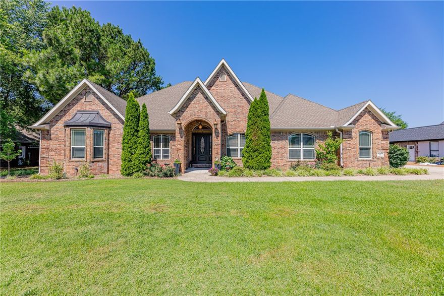 Beautiful heated salt water inground pool with cover and dolphin cleaner added to this beautiful home in Pinnacle! Enjoy the view from the wrap around covered patio or open the back French doors to enter into the living areas. So many extra features in this house. The gourmet kitchen has a large island, 6 burner gas range & grill, 5 star dual oven,  2 dishwashers, newer refrigerator, newer microwave, prep sink, & walk in pantry. Office and media room. 3 of the 5 bedrooms are on the main level. Every bedroom has walk in closets and four of the bedrooms are ensuites. There are two laundry room-one is right off of the master closet. The washer & dryer convey. Real hardwood floors. Formal dining room. Gas log fireplace in the living room. New ceiling fans through out.  Lots of storage. The gray cabinets in the 3 car garage convey. 3 HVAC units. One is dedicated to the master bedroom.  AHS home warranty offered.