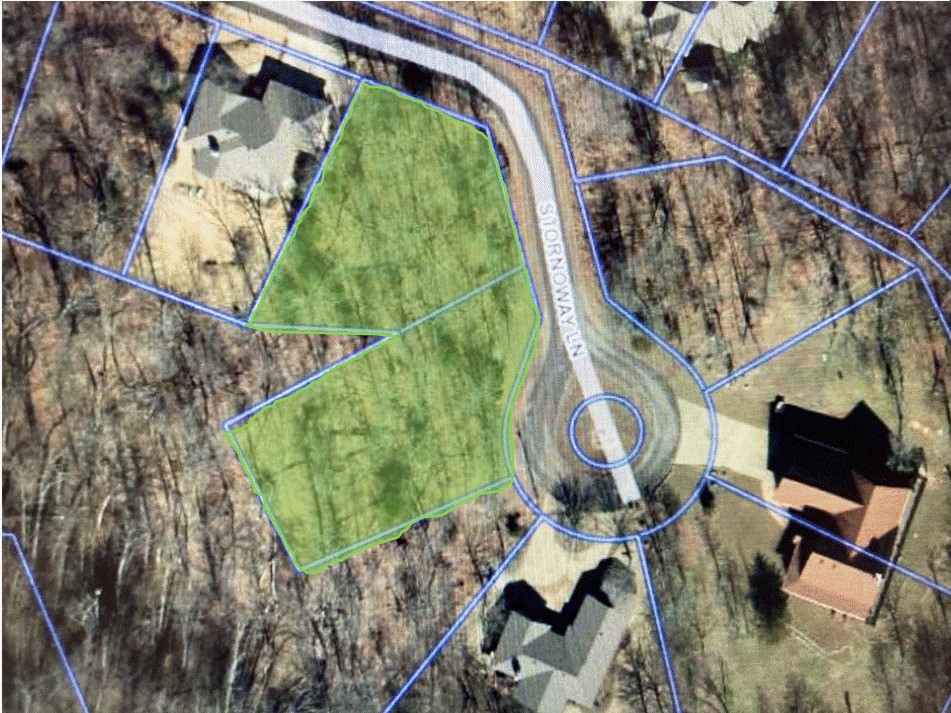 Two beautiful adjacent and level lots totaling .69 acres in a neighborhood with new and upscale homes. Located between Highland Golf Course and Loch Lomond Boat Launch and easy access to the new bypass. Larger lot has community property on three sides. Build one home or two. Seller requires both lots to be sold simultaneously.