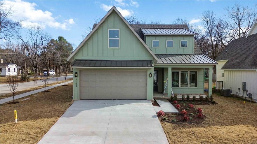 Welcome to Dutton Woods.This beautifully designed home is in a central Fayetteville location with quick access to I-49, 71B, and the Razorback Greenway. This spacious 4-bedroom, 3.5 bath residence also features a dedicated office and a versatile bonus room, giving you all the flexibility your lifestyle needs.Inside, you’ll find an inviting open layout accented by quartz countertops, double oven, and extra storage.The large laundry/mudroom, complete with built-in lockers.The primary suite is a true retreat, offering a spa-like bath with a soaking tub, an oversized shower, and elegant modern details.With thoughtful design, premium features, and an unbeatable location close to Fayetteville’s best trails, shops, and amenities, this home is move-in ready for its next chapter.