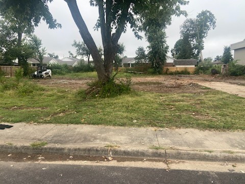 Newly vacant lot near downtown Rogers. On site utilities. Great location for a business or multi-family investment property. Road frontage recently upgraded to include bike lanes. Zoned T4.2
